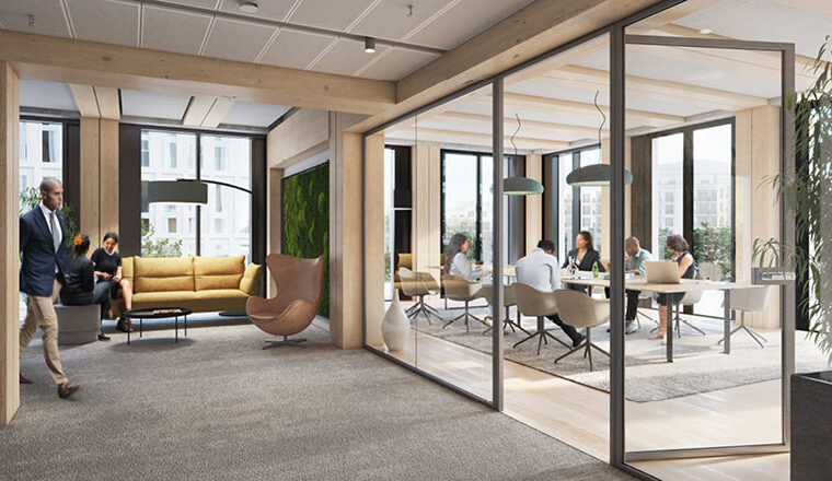 Bequeme Lounge vor der Meeting Zone Personen arbeiten in einem offenen, hellen Besprechungsraum vor einer Lounge